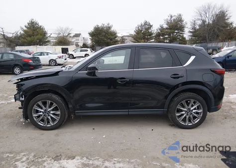 2021 Mazda Cx-5 Grand Touring z USA, uszkodzony, nr VIN JM3KFADMXM1340533